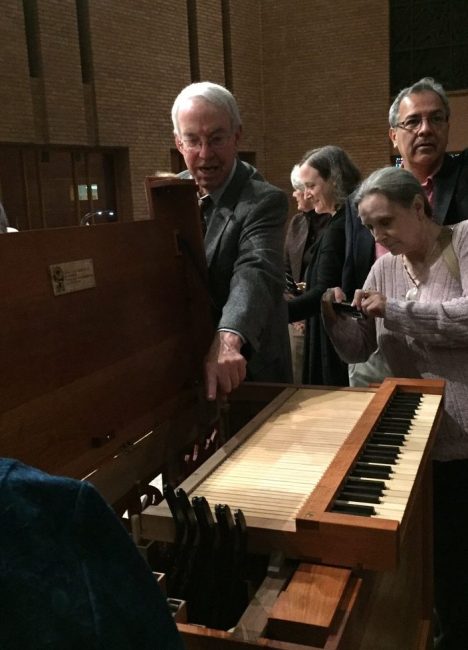 John Boody points to features on Opus 72 following the inaugural concert at Bradley Hills Presbyterian Church